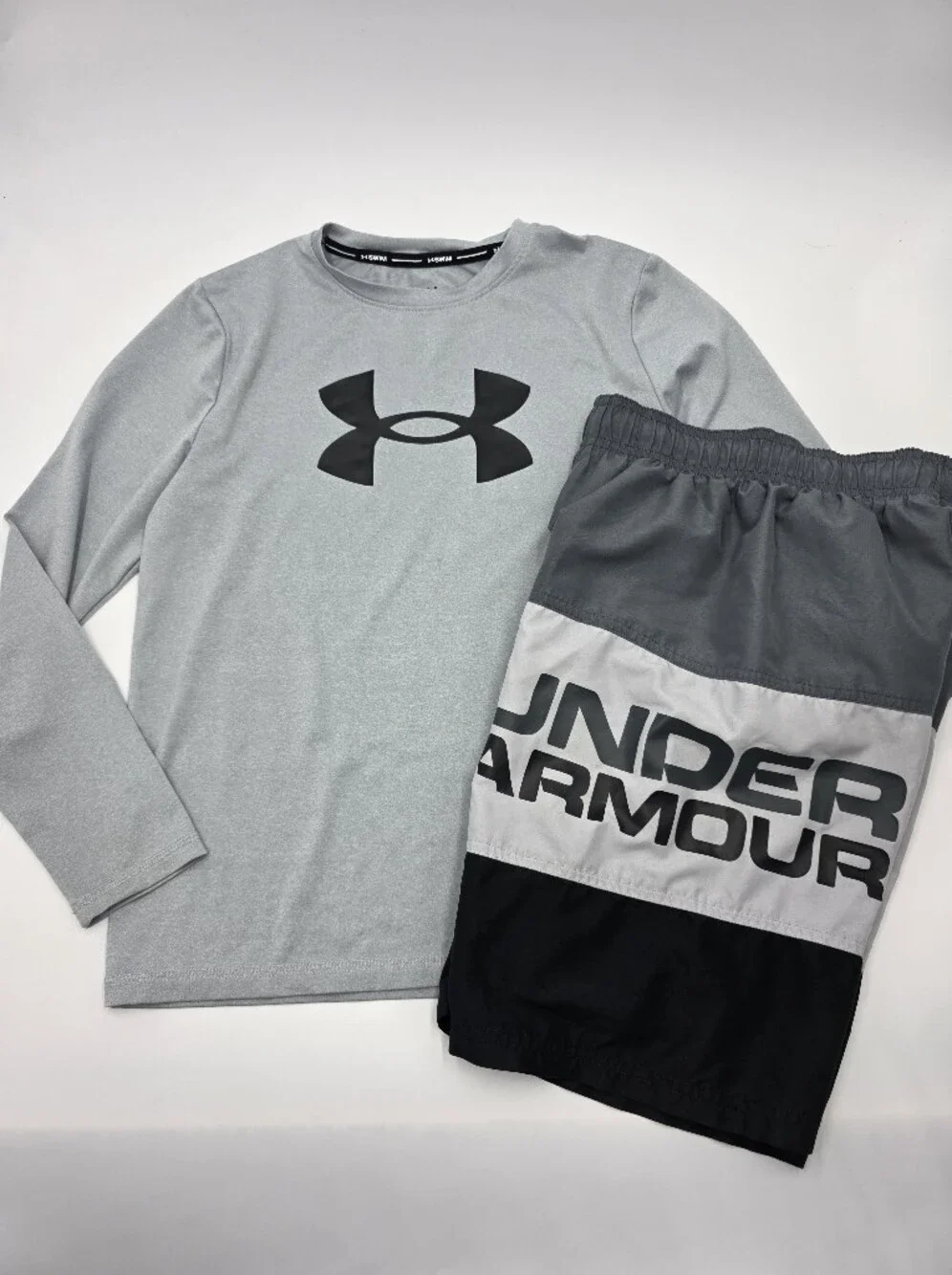 Under Armour boys' rashguard and swim trunks size M